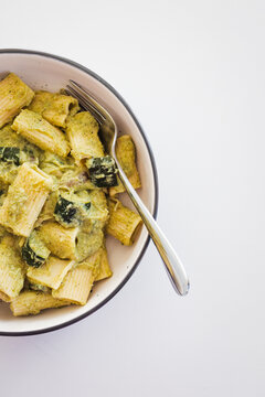 creamy zucchini rigatoni pasta with vegetables for a healthy vegetarian meal