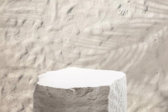 Selective focus.sandstone top product display with brick wall in tropical design