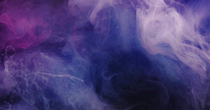 Color cloud smoke. Ink splash water. Defocused blend mist art blue pink purple vibrant fluid pigment explosion on abstract background.