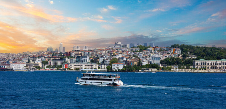 Istanbul bosphorus skyline with ferry boat at sunset