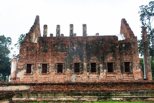 Ancient architecture Ubosot or antique ruins building brick ordination hall for thai people travelers travel visit respect praying myth holy buddha at Wat Pho Prathap Chang Temple in Phichit, Thailand