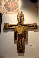 Obraz premium San Gimignano, Italy 03.04.2020: Painted crucifix by Maestro di Varlungo