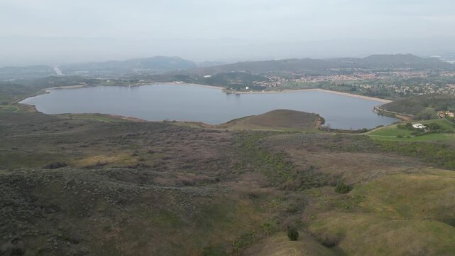 Bard Lake, or Wood Ranch Reservoir, a large reservoir on the border of Thousand Oaks and Simi Valley, California. Moving forward, shot on an overcast afternoon in January 2024.