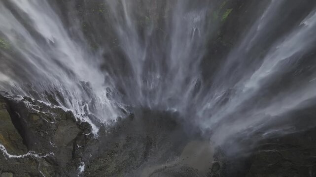 Aerial view of the natural landscape of Tumpak Sewu Waterfall in Java, Indonesia