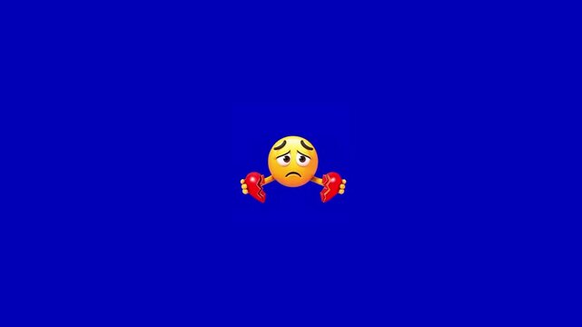 Three identical sad yellow emoticons holding broken red hearts against a solid blue background screen with arranged horizontal row across wide frame emoticons downcast eyes holding two halves grief