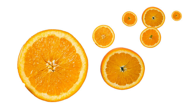 Multiple round orange slices floating isolated png transparent background