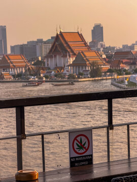 No marijuana allowed sign with bangkok temple view