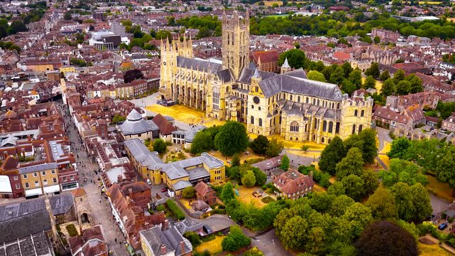 Aerial view of Canterbury Cathedral rising above the historic city in Kent, England; ideal for heritage tourism, architecture, travel and destination marketing