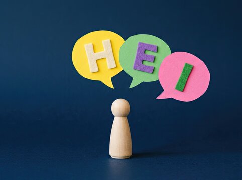 Wooden figure standing below colorful speech bubbles spelling HEI ideal for friendly greeting content symbolizing welcoming connection and dialogue