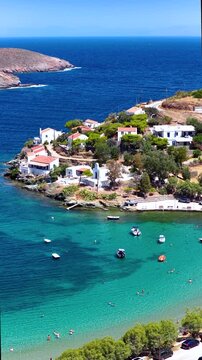 Aerial summer day view of the bay and beach of Otzias, Kea Tzia Island, Greece, with turquoise sea