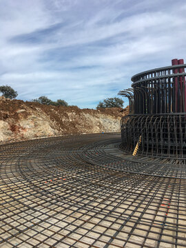 Wind turbine foundation construction showing rebar framework