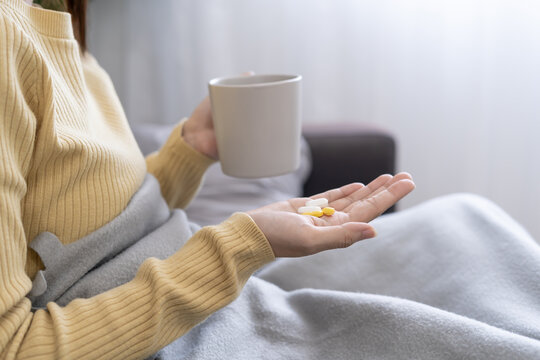 girl holding medicine and take medicine, pain, cure disease, sterilize, take vitamin, sedative, health care, Dietary supplement, medicine for medical treatment, tonic, daily dosage of medication