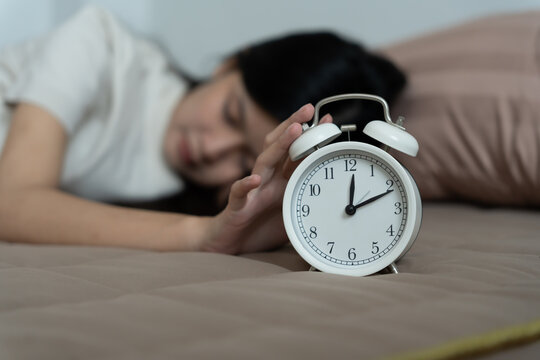 Asia young woman sleep late, lady is late appointment or work or class study, overslept, difficulty get up in mornings, time worried, not on time, sleepy, over due, over due