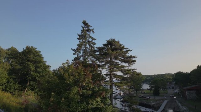 rising over trees revealing Rockport Marine Park in Maine