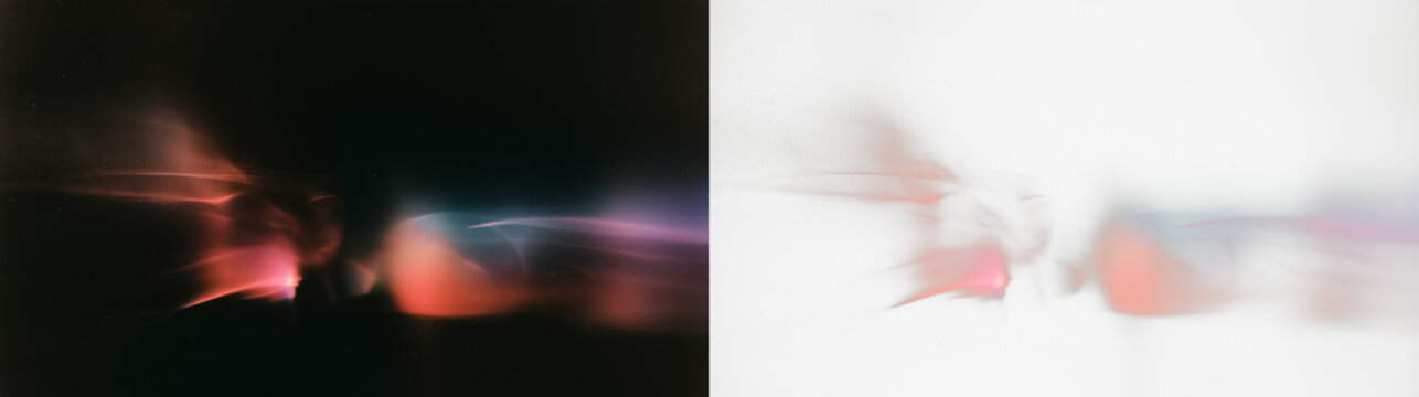 abstract colorful light leaks and lens flare effects on dark background