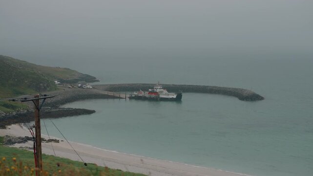 Caledonian MacBrayne ferry MV Lochalainn arriving at Eriskay with Bonnie Prince Charlie Beach in the foreground, Scotland, UK - 10 September 2026.
