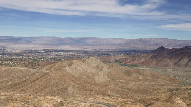 View from Coachella Valley Vista Point, overlooking the Coachella Valley of the Colorado Desert in Riverside County, California. Visible cities including Palm Desert, Indian Wells, and Cahuilla Hills.