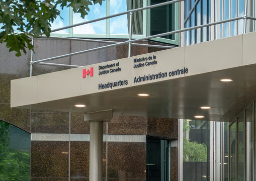 Ottawa, ON, Canada - Sept 14, 2026: Signage at the Department of Justice Canada Headquarters building entry in downtown Ottawa.