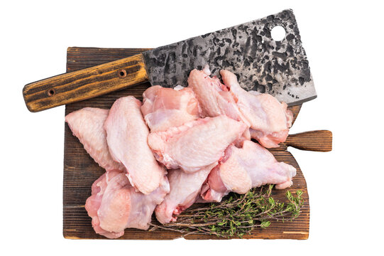 Fresh chicken wings, showcasing their natural texture, perfect for creating savory snacks or hearty meals. isolated on white background. top view