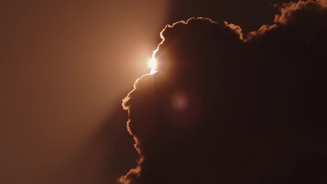 Sun appears from the cumulus cloud and starts shining