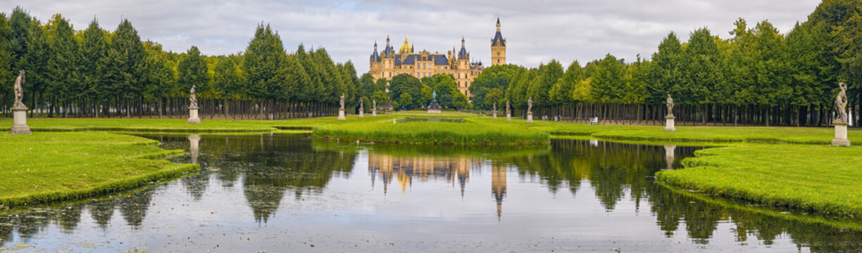 Panoramic view of Schlossgarten Schwerin with Castle Schwerin in background (Mecklenburg-Vorpommern, Germany)
