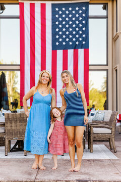 Three generations of women celebrating a patriotic holiday