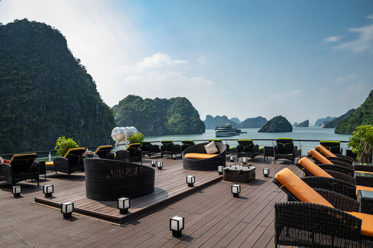 Lounge chairs on a cruise ship deck in beautiful Ha Long Bay