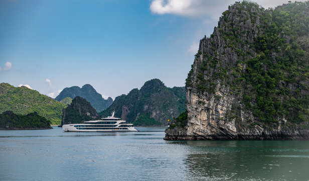 Luxury cruise ship sailing through Ha Long Bay Vietnam