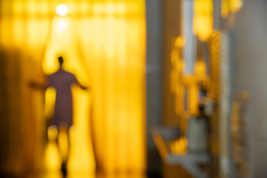 Blurred Worker Entering Pass Yellow Plastic Strip Curtain for Industrial Design Background Advertise