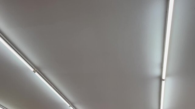 Minimalist abstract background with parallel fluorescent tube lights