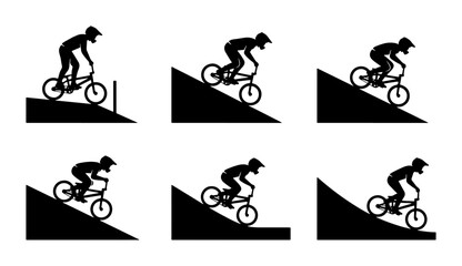 Fototapeta premium BMX rider silhouettes performing stunts on ramps and jumps