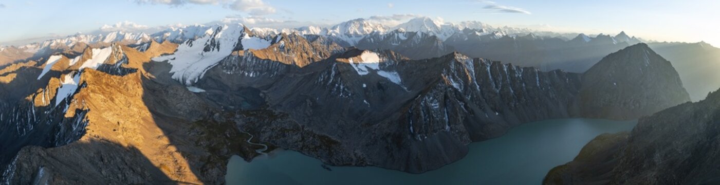 Evening mood, mountain panorama, aerial view, 4000 metre peak with glacier, mountain pass and mountain lake Ala-Kul Lake, Tien Shan, Kyrgyzstan