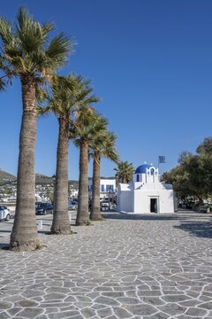 Blue and White Greek Orthodox Church Agios Nikolaos with Greek Flag, Parikia, Paros, Cyclades, Aegean Sea, Greece