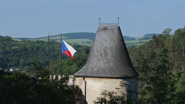 National flag of the Czech Republic at Karlstejn Castle in Czechia.