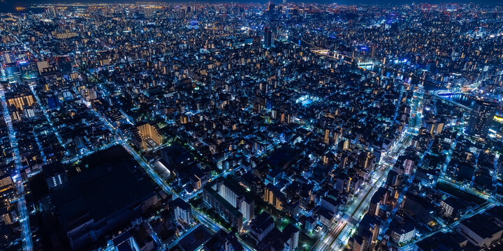 Tokyo Nightscape and Illuminated Urban Grid from Above