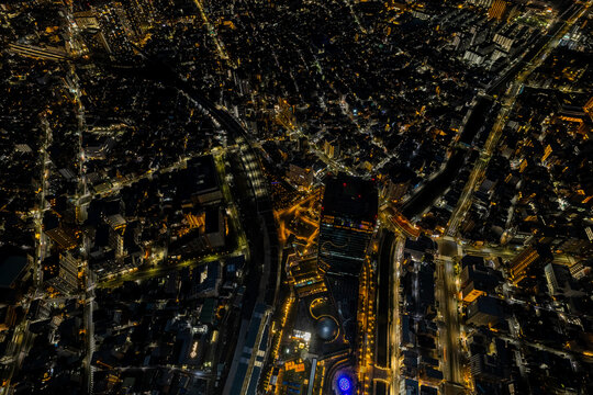 Illuminated Tokyo Streets Seen from Above at Night