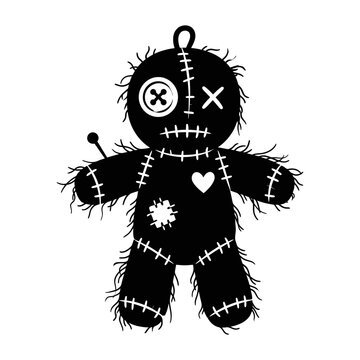 Black stitched rag doll with symbols on head with figure patchwork symbols symbols heart shape