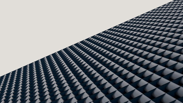 Black triangular patterned architectural surface with geometric