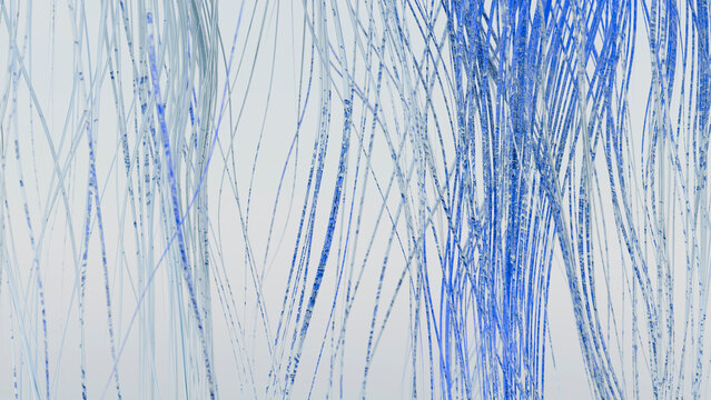 Blue thin transparent strands forming an abstract vertical pattern
