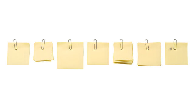 Yellow sticky notes with metal paper clips, collection of blank adhesive memo pads, office stationery set for reminders and organization