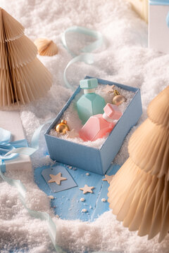 Great perfume is kept inside very pretty glass Christmas container.