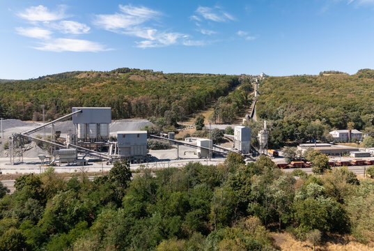 Aerial view of Uzsa basalt quarry and rail freight in Uzsa, Hungary