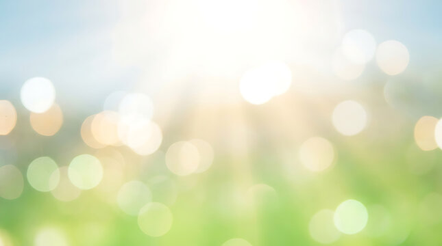 Abstract soft green gradient background with glowing light orbs and bokeh effect
