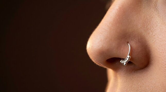 Silver Nose Ring Closeup On Human Nose For Fashion And Beauty Jewelry Style
