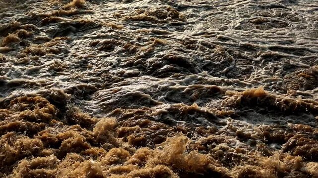 Slow Motion of Raging Muddy Water Flash Flood