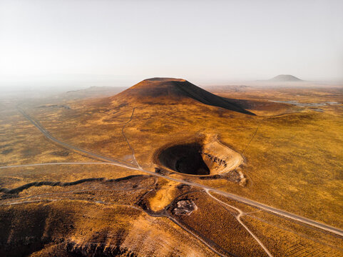 Aerial view of volcanic craters and an ash cones, surrounded by arid Mars like landscapes near Lake Meke in Karapinar, Konya, Turkiye.