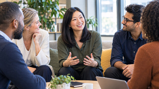 East Asian woman building authentic connection in peer circle