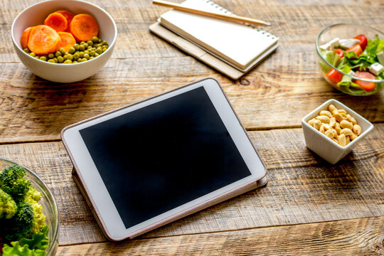 concept diet and tablet with vegetables mock up