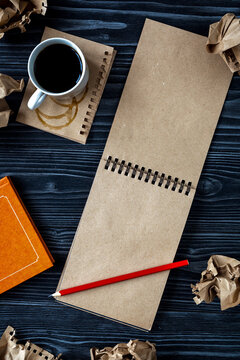 concept of writer desktop wooden background top view mock up