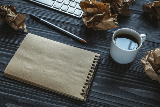 concept of writer desktop wooden background top view mock up
